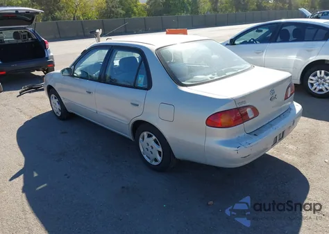 2000 Toyota Corolla Le из США, поврежденный, VIN 1NXBR12E4YZ325974